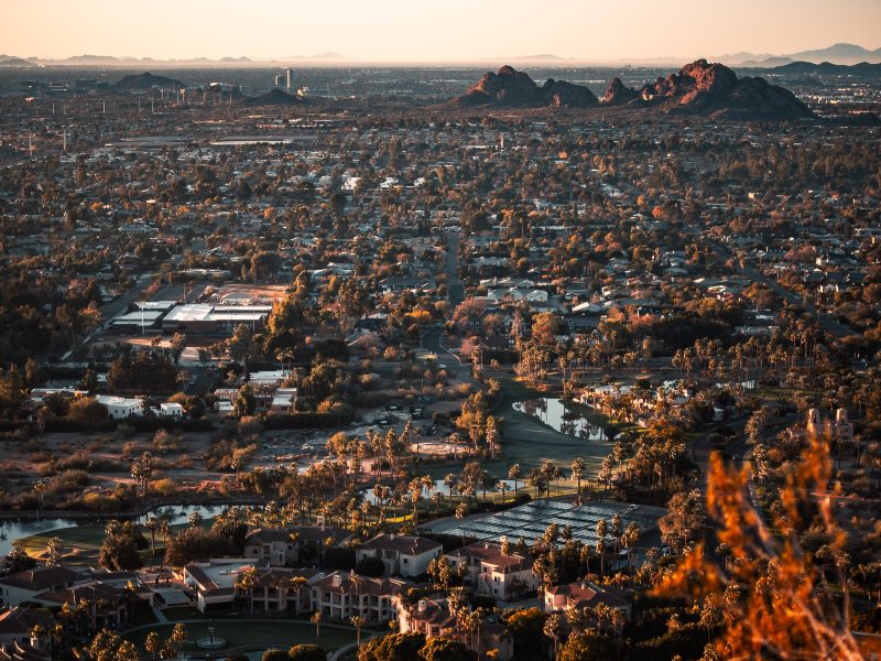 Photo of houses near big rocky structures