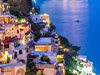 Greece white buildings with water, at night, lights
