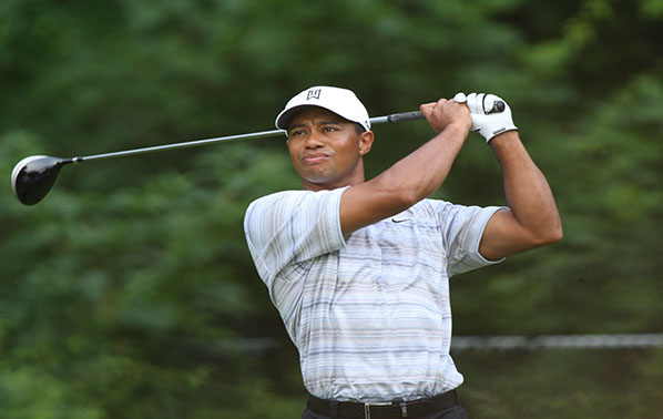 Tiger Woods swinging in one of his competitions