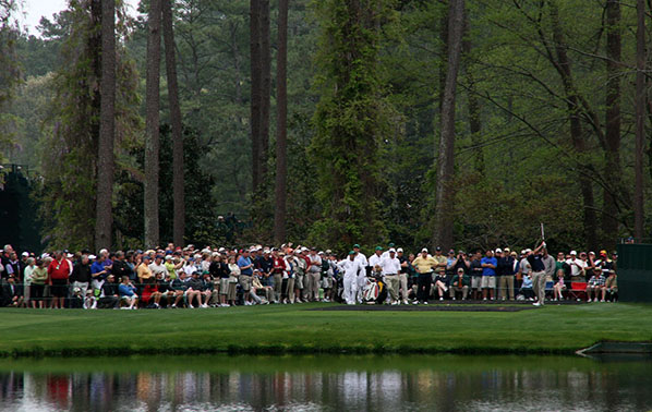 crowd spectating golfer on the tee box at the Masters Tournament