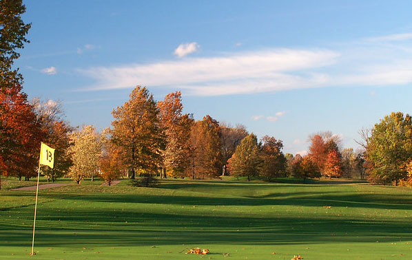 golf course green with flag during the fall