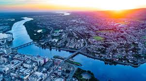Photo of Limerick City skyscrapers and bridges near the River Shannon