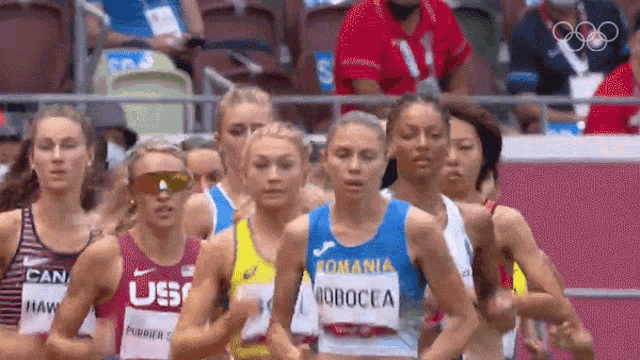 girls running on the track