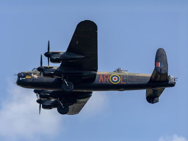 World War Two era bomber flying over