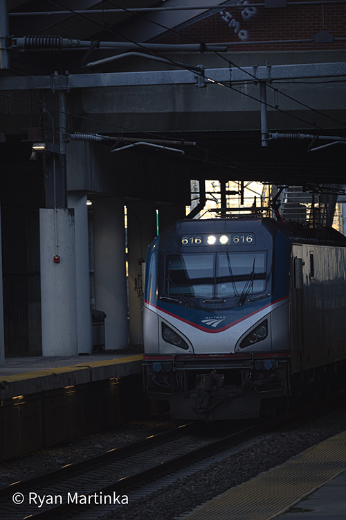 Amtrak train in a dark train station