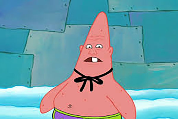  Patrick with a goofy face looking like a pinhead